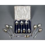 Thirteen silver golf trophy teaspoons - various dates, 5.4oz (contained in a six-spoon case)