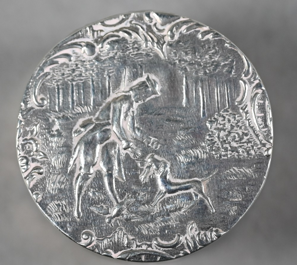 A Continental silver cylindrical snuff box, the hinged cover embossed with a huntsman with dog, - Image 3 of 4