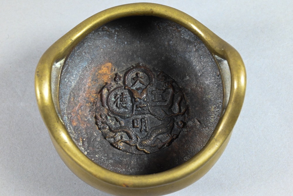 A 19th century Chinese bronze incense burner or censer of typical tripod form with compressed - Image 3 of 7