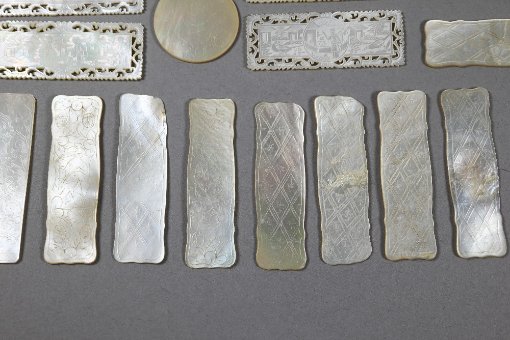 A collection of 18th and 19th century Chinese mother-of-pearl gaming counters including a mounted - Image 6 of 10