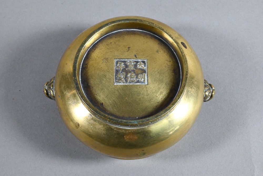 A 19th century Chinese bronze censer or incense burner of compressed globular form with cast - Image 5 of 8