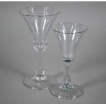 A Georgian wine glass, the trumpet-shaped bowl with air-drop on plain stem with elongated bubble,