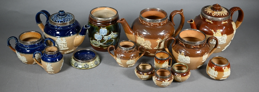Two Doulton stoneware silver-rimmed three-piece tea services and other similar wares