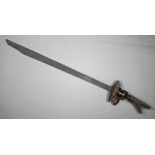 Antique Phillipino kampilan (sword) with 72 cm shaped blade and carved wood hilt, 98 cm overall