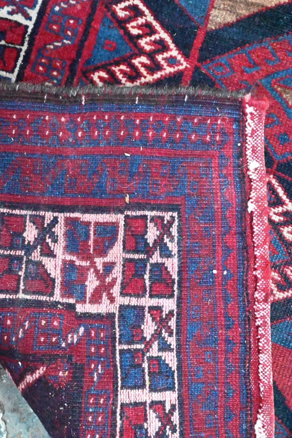 A Persian blue/red ground geometric design rug, 258 cm x 166 cm - Image 4 of 4