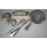 Planished silver hand-mirror, brush, button-hook, shoehorn and two jar-lids, A&J Zimmerman Ltd,