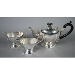 Silver bachelor tea service with ebonised finial and composite handle, on stemmed foot, Williams (