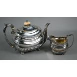 Regency silver teapot of oblong form with half-reeding and guilloche band, ivory finial and