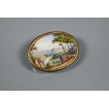 An oval painted porcelain plaque featuring classical Italianate landscape, with brooch fitting, 3.