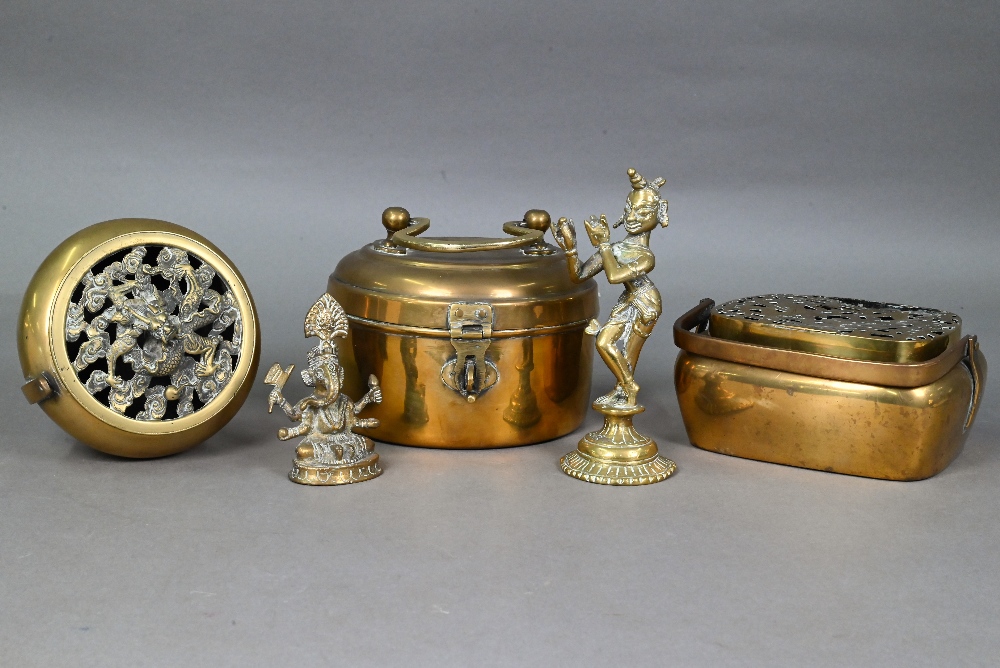 A Chinese circular brass travelling handwarmer/brazier with reticulated dragon cast cover 13 cm