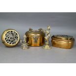 A Chinese circular brass travelling handwarmer/brazier with reticulated dragon cast cover 13 cm