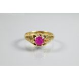 An 18ct yellow gold ring set with single ruby, size Q