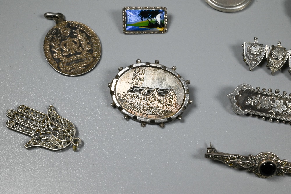 A collection of Victorian and later silver and white metal brooches, pendants and pins including - Image 5 of 6