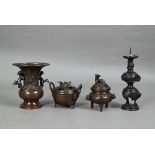 Four late 19th or early 20th century Japanese bronzes comprising a small baluster vase with flared