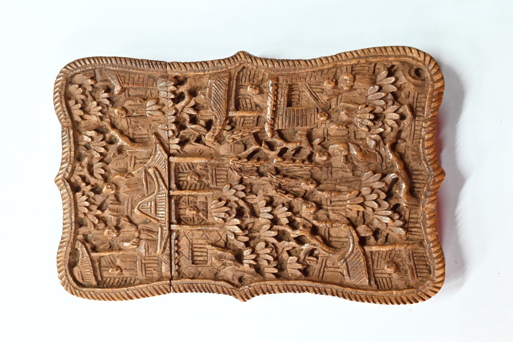 A 19th century Chinese Canton sandalwood card case profusely carved with a village scene, - Image 9 of 10