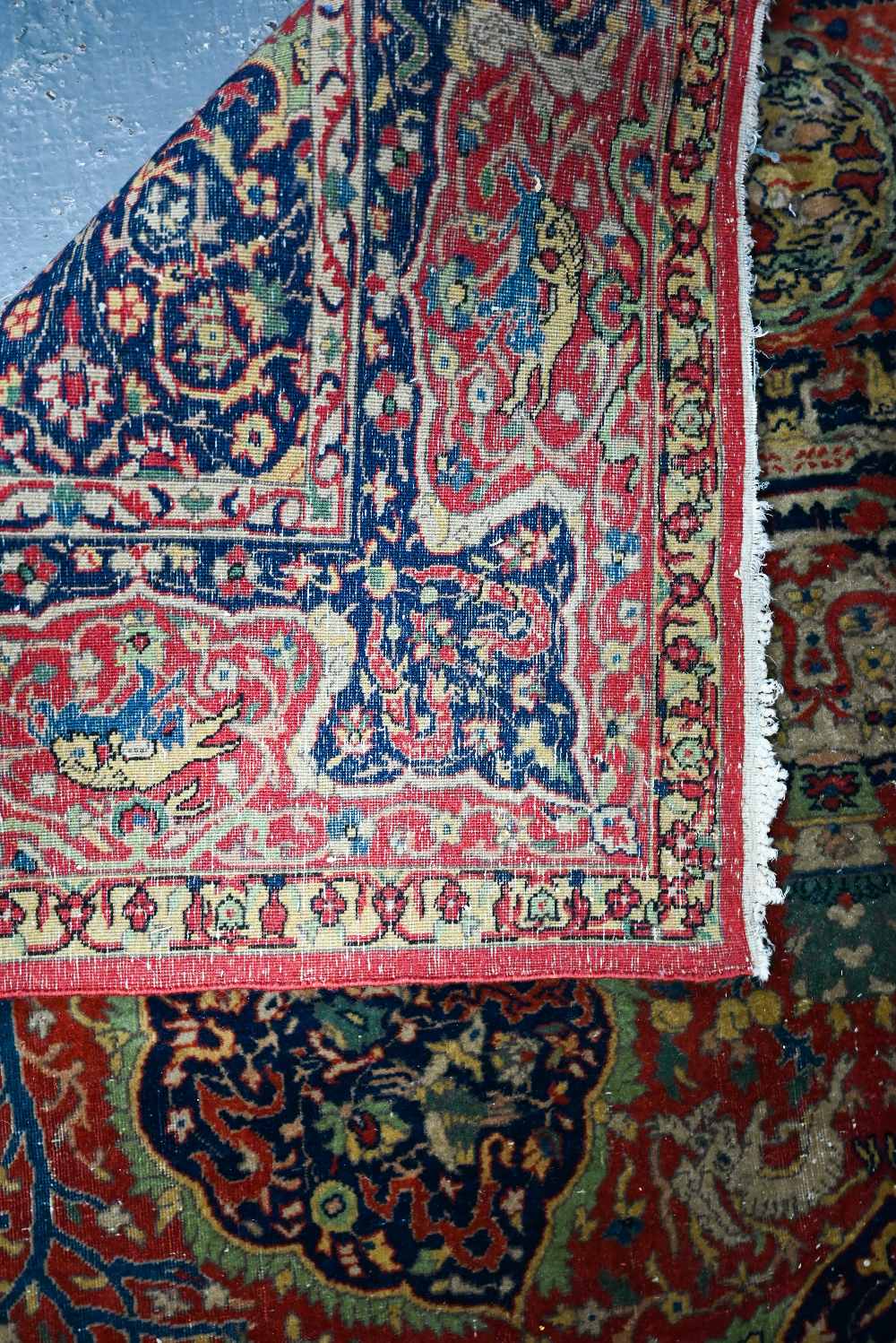 A good fine antique Persian Kashan rug, the rust-red ground centred by a blue ground medallion, - Image 3 of 3