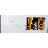 HM Queen Elizabeth II and HRH the Duke of Edinburgh Christmas card with two gilt cyphers to front,