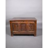 An early 18th and later oak coffer, with lunette carved frieze over a trio of incised panels, on