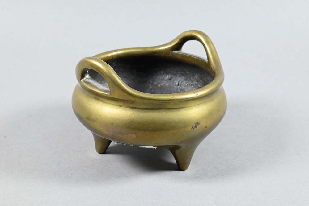 A 19th century Chinese bronze incense burner or censer of typical tripod form with compressed - Image 2 of 7