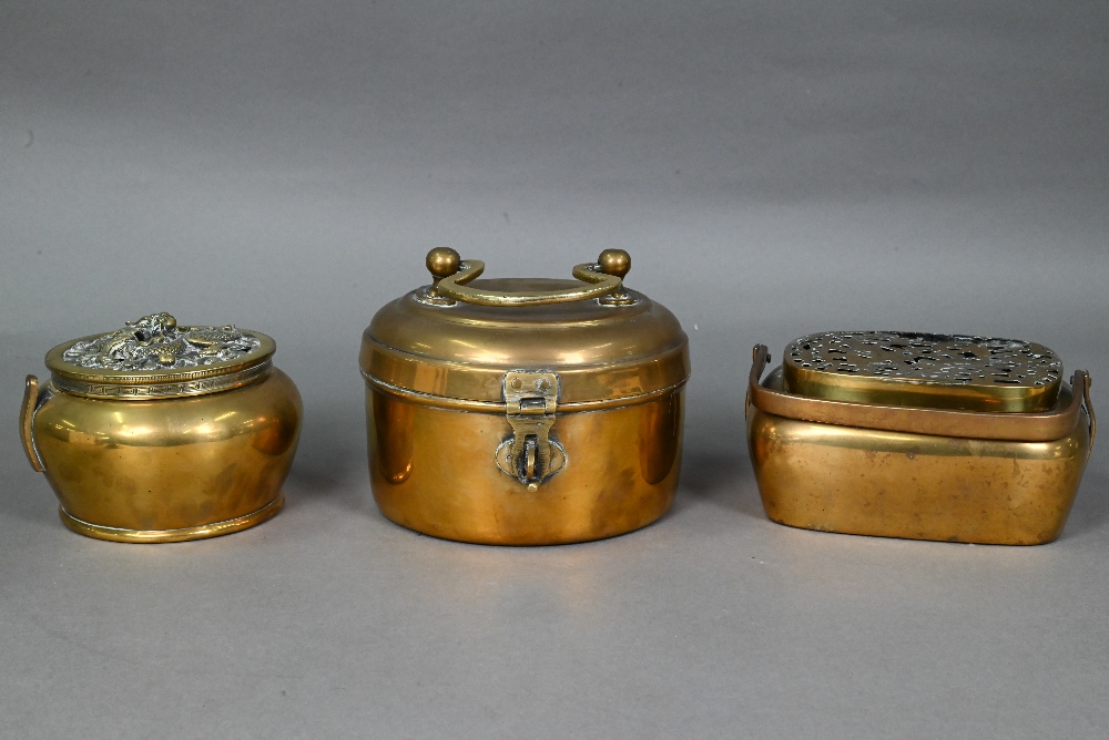 A Chinese circular brass travelling handwarmer/brazier with reticulated dragon cast cover 13 cm - Image 2 of 10