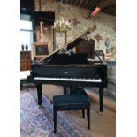 A modern Challen gloss ebonised baby grand piano, frame no. GP148 1181587, fitted with an electric