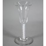 A Georgian drinking glass with trumpet-shaped bowl on double opaque twist stem, 17 cm