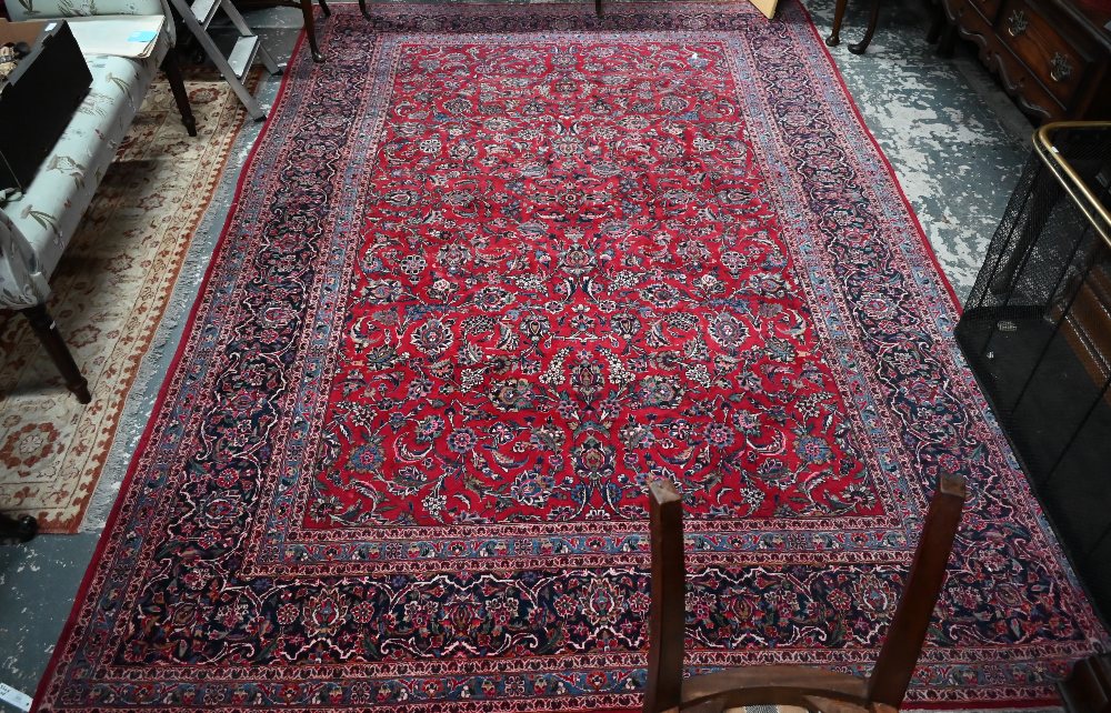 A fine old Persian hand-made Kashan carpet, the red ground with repeating linked garden vine design, - Image 3 of 12