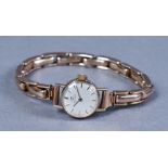 Lady's Tissot 9ct gold wristwatch, the 17 jewel movement with 16mm silvered dial, on 9ct gold