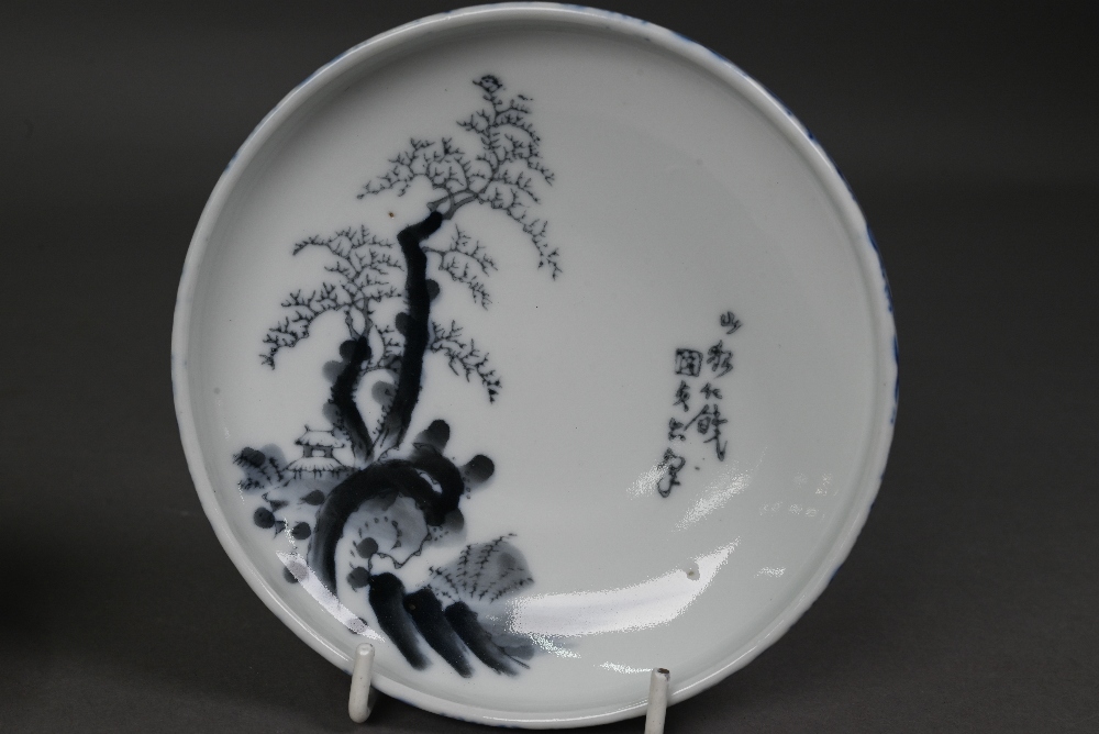 A pair of Japanese Arita blue and white bowls, Taisho/Showa period, the interiors painted in - Image 6 of 7