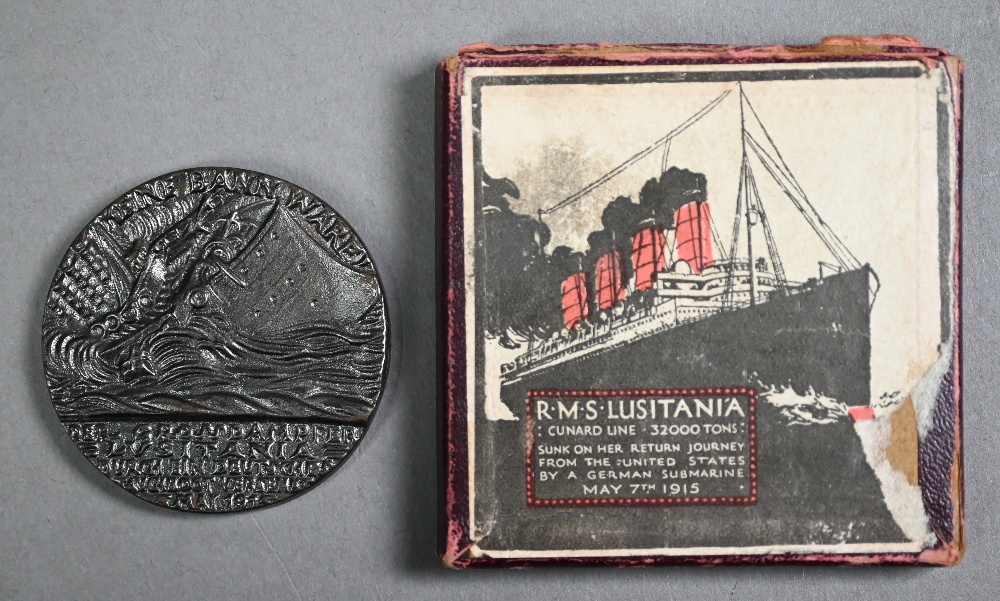 Replica 'Lusitania' medal - boxed with French explanatory pamphlet to/w a miniature carved wood ' - Image 2 of 3