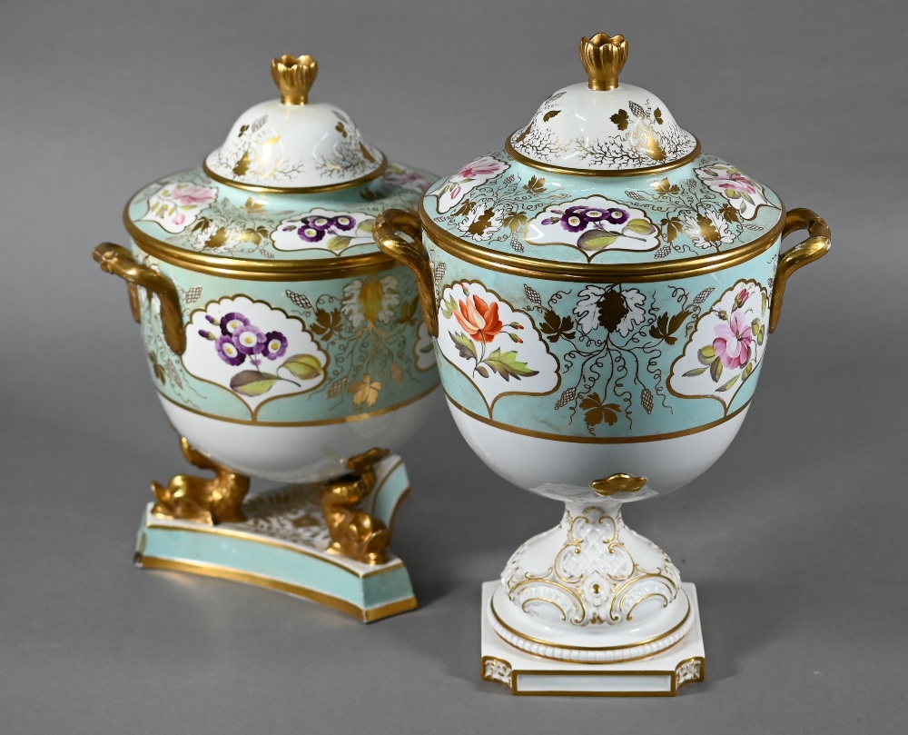 Two early 19th century turquoise-ground and gilt covered urns, the reserves painted with floral