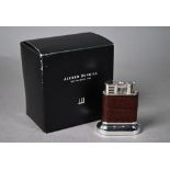Alfred Dunhill table cigarette lighter with crocodile leather-bound electroplated body, in