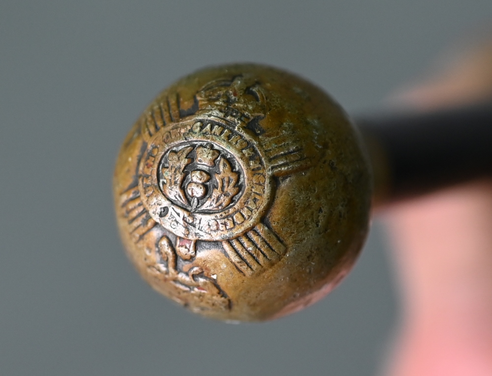 Antique ebonised military swagger-stick, the metal pommel embossed with regimental badge - Queen's - Image 3 of 3