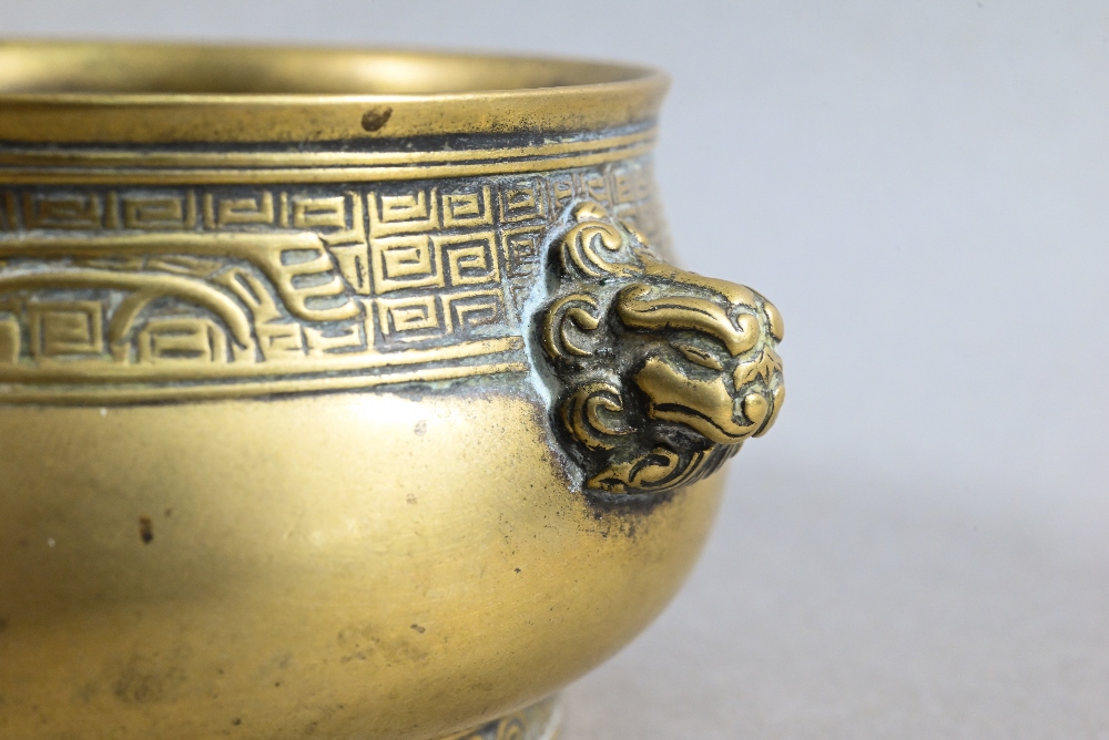 A 19th century Chinese bronze censer or incense burner of compressed globular form with cast - Image 3 of 8