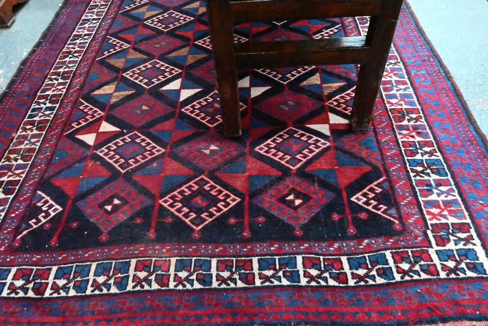 A Persian blue/red ground geometric design rug, 258 cm x 166 cm - Image 2 of 4