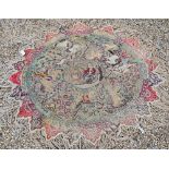 An antique Kayserie circular silk and metal thread rug