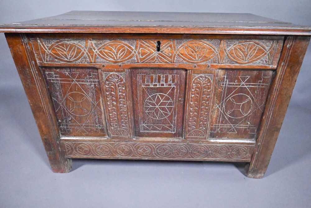 An early 18th and later oak coffer, with lunette carved frieze over a trio of incised panels, on - Image 4 of 8