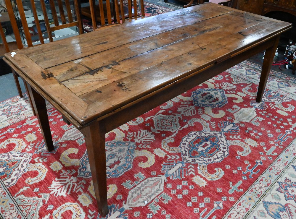 An antique French fruitwood extending draw leaf dining table, with frieze drawer to one end, - Image 3 of 15