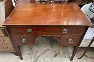 A 19th century mahogany sideboard with a rectangular top and three drawers on square tapering legs