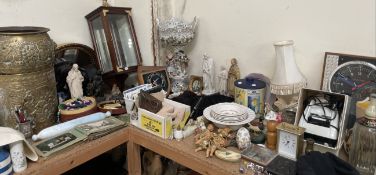 A brass coal bucket together with a brass jardiniere, gilt wall mirror, display cabinet, postcards,