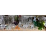 Lead crystal decanters together with green glass vases, green glass bowls, drinking glasses,