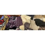 A quantity of lady's clothing including Ann Harvey trousers, lambswool ponchos,