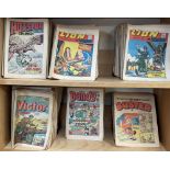 A collection of comics and from the 1970's and 1980's including Hotspur, Lion, Victor,