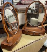 A pair of 20th century yew wood toilet mirrors with base drawers