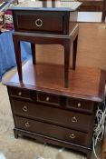 A Stag dressing chest with five drawers on bracket feet together with a matching bedside cabinet