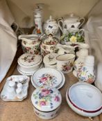 An Aynsley Cottage Garden pattern jar and cover together with assorted decorative porcelain jugs,