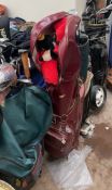 Golf - four golf bags, together with a collection of clubs including Dunlop, Wilson, Spalding, etc,