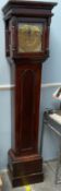 A 19th century mahogany longcase clock, with a moulded cornice above a long trunk door,