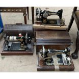 A Frister & Rossmann sewing machine and two singer sewing machines,