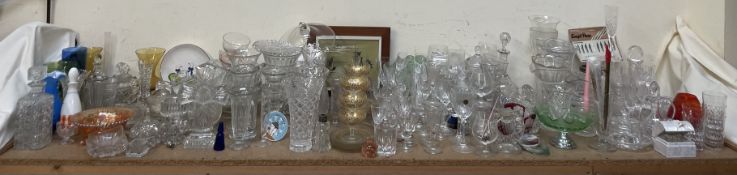 An extensive collection of glasswares including vases, drinking glasses, jugs,